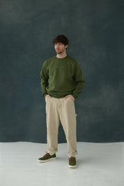 Male model wearing Urban Green / Orange Sweatshirt